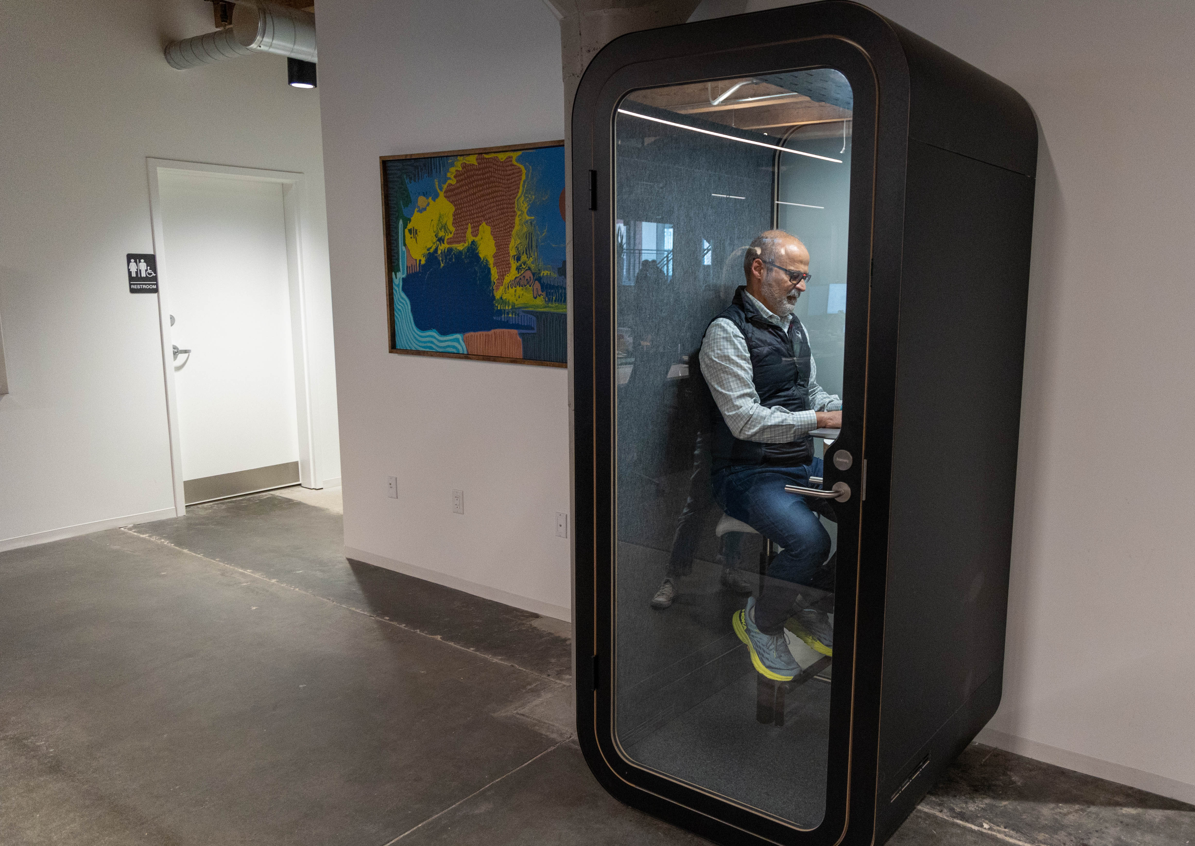 Man sitting in a sound proof office